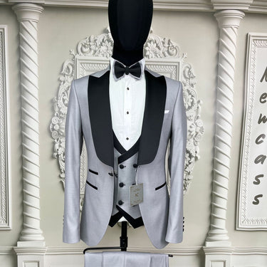 Single Button Three Pieces Tuxedo Suit with contrasting green velvet Lapel, matching bow tie and Black Pants.