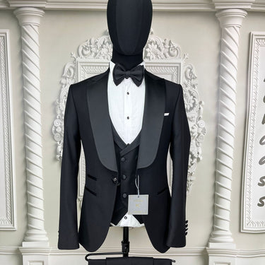 Single Button Three Pieces Tuxedo Suit with contrasting green velvet Lapel, matching bow tie and Black Pants.