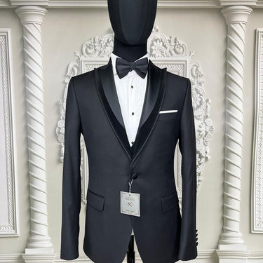 Single Button Three Piece Tuxedo Suit with Contrasting Black SatinLapel, matching bow tie and Black Pants.