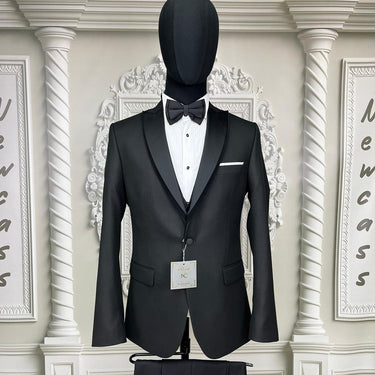 Single Button Three Pieces Tuxedo Suit with Contrasting Black Satin Lapel, matching bow tie and Black Pants.