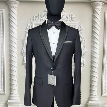 Single Button Three Pieces Tuxedo Suit with Contrasting Black Satin Lapel, matching bow tie and Black Pants.