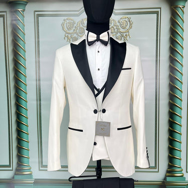 Three Pieces Tuxedo Suit with contrasting black velvet Lapel, matching bow tie and Black Pants.